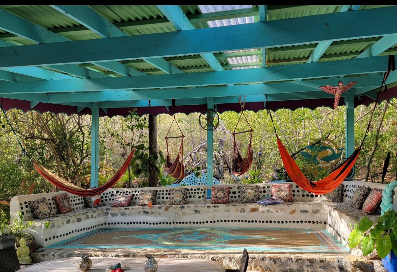 Open air lounge with hammocks among the gardens at 4 Elements